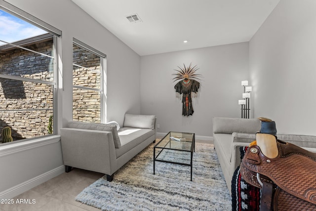 3326 Josey Wales Way, Wickenburg, AZ 85390 - tiled living area with plenty of natural light and baseboards