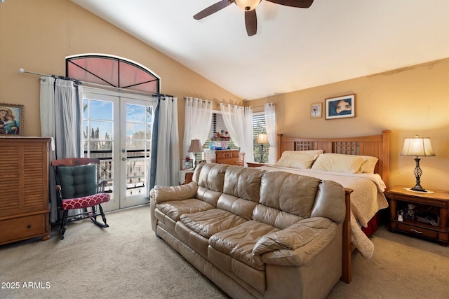 bedroom featuring access to outside, light colored carpet, ceiling fan, and vaulted ceiling