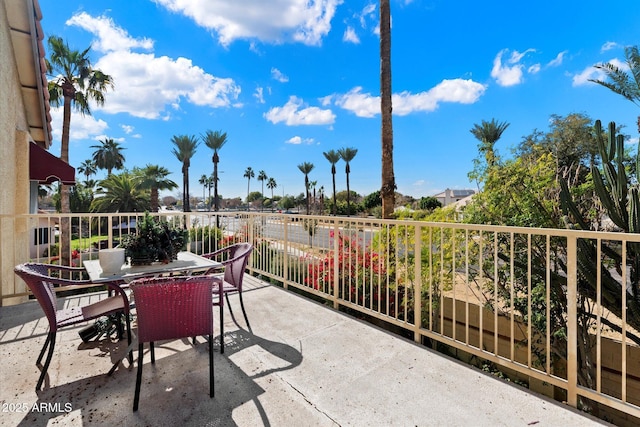 view of patio / terrace with a balcony