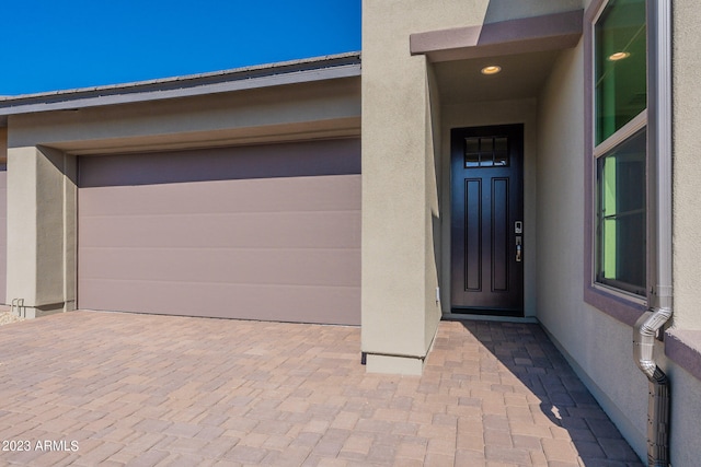 entrance to property with a garage