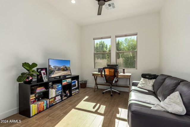 office featuring hardwood / wood-style flooring and ceiling fan