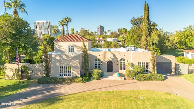 view of front of home with a front lawn