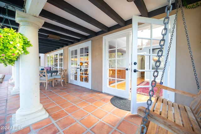 view of patio featuring french doors