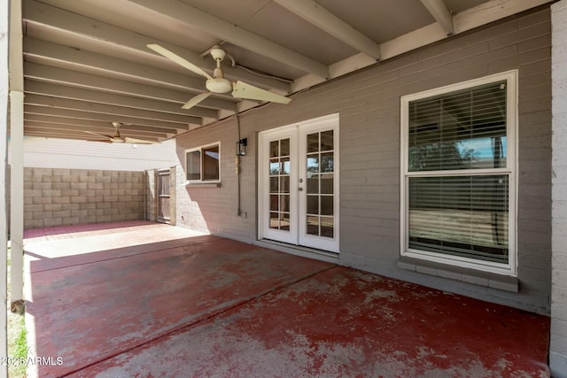 view of patio with french doors and a ceiling fan