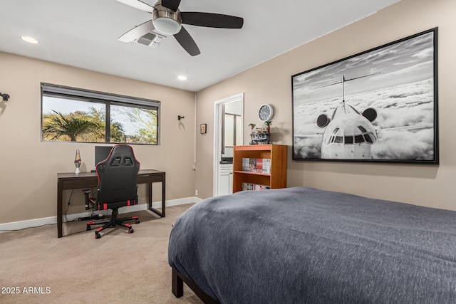 bedroom with ceiling fan and light colored carpet