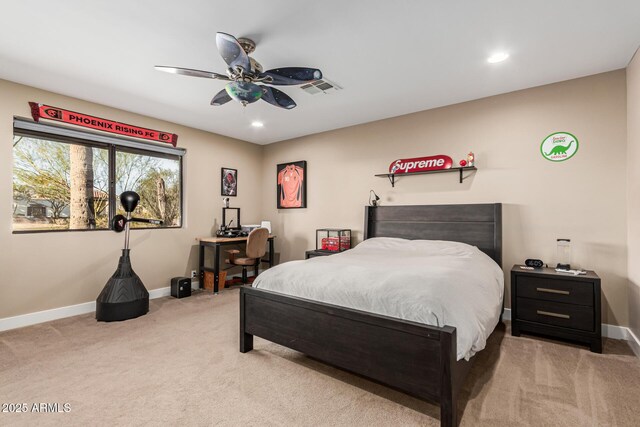 bedroom with ceiling fan and carpet flooring