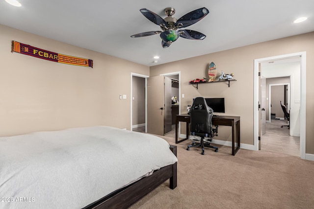 carpeted bedroom featuring ceiling fan