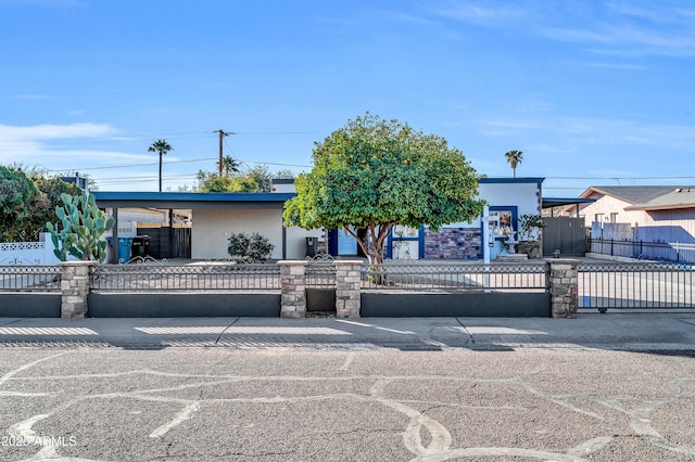 view of front of property with a carport