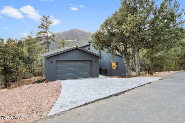 garage featuring a mountain view