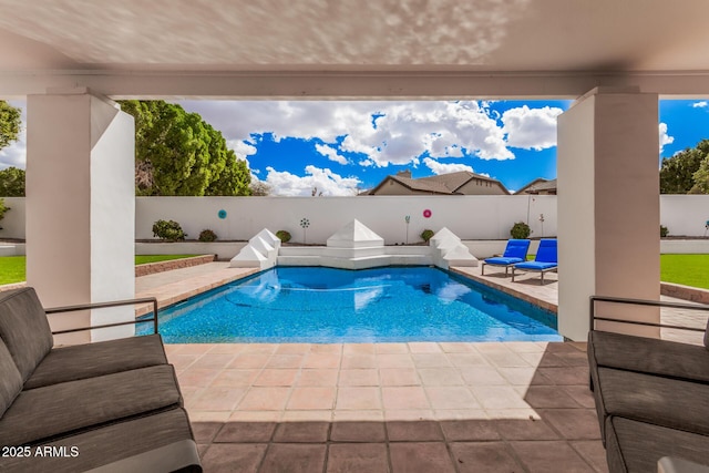 view of pool featuring a fenced backyard, a fenced in pool, and a patio