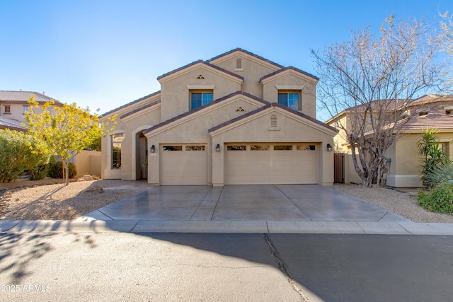 mediterranean / spanish-style home with a garage