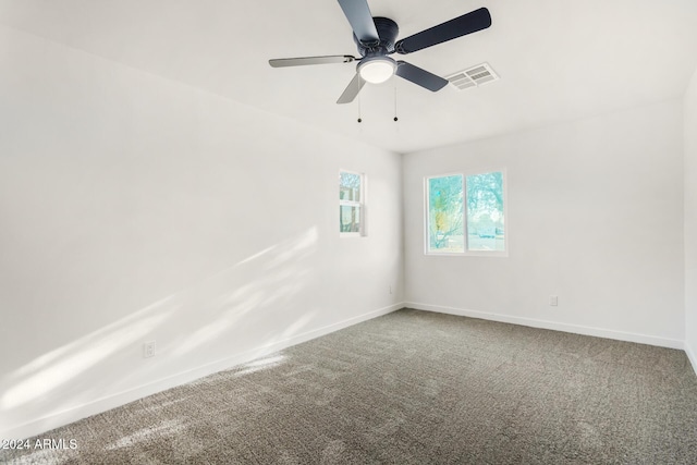 carpeted empty room with ceiling fan