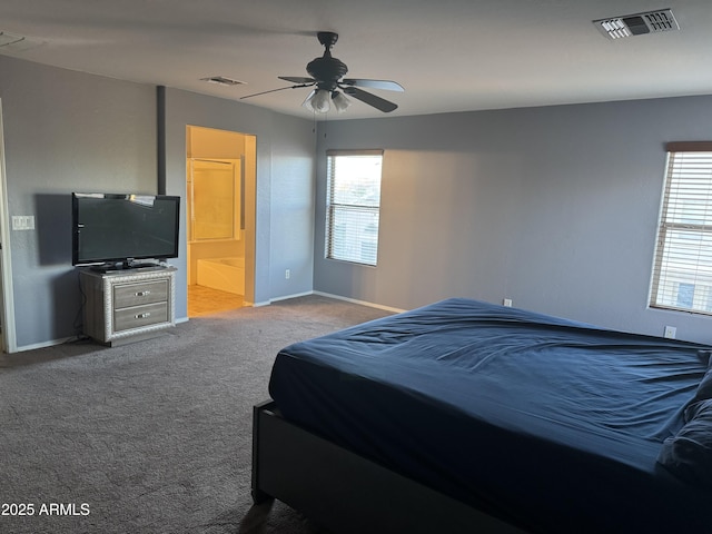 9108 W Kirby Ave, Tolleson, AZ 85353 - carpeted bedroom with visible vents, multiple windows, and baseboards