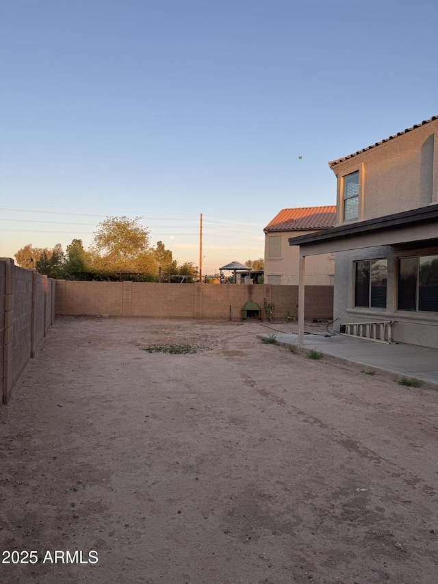 9108 W Kirby Ave, Tolleson, AZ 85353 - view of yard featuring a patio and a fenced backyard