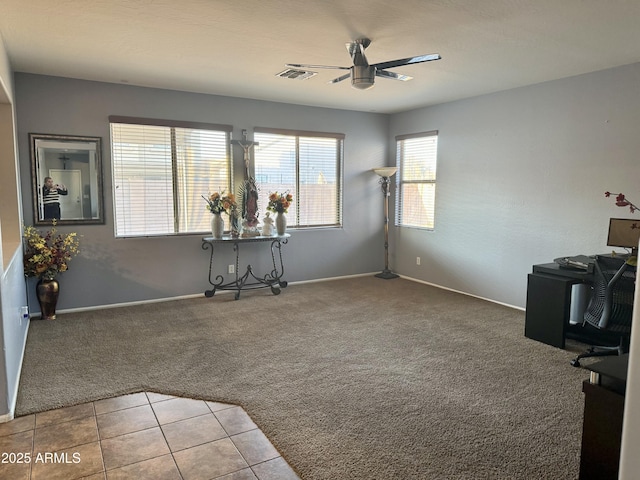 9108 W Kirby Ave, Tolleson, AZ 85353 - interior space with visible vents, ceiling fan, carpet, and baseboards
