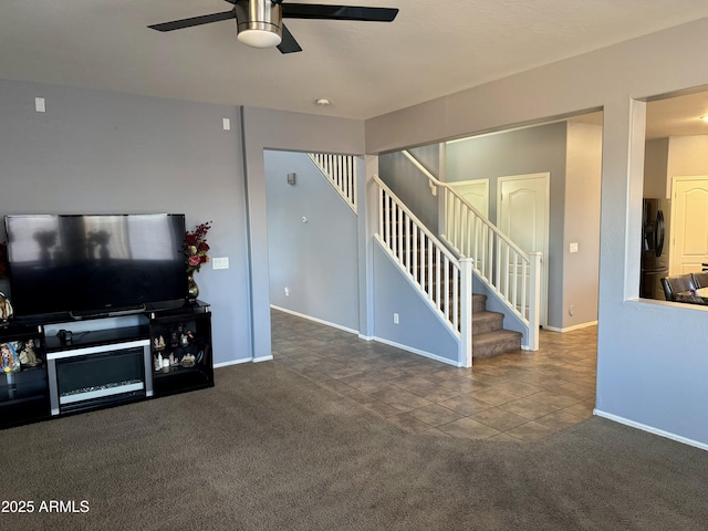 9108 W Kirby Ave, Tolleson, AZ 85353 - tiled living area with ceiling fan, carpet, baseboards, and stairs