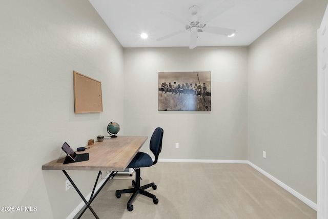 office featuring light carpet, recessed lighting, a ceiling fan, and baseboards