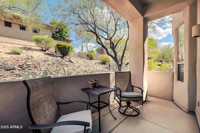 view of patio with a balcony