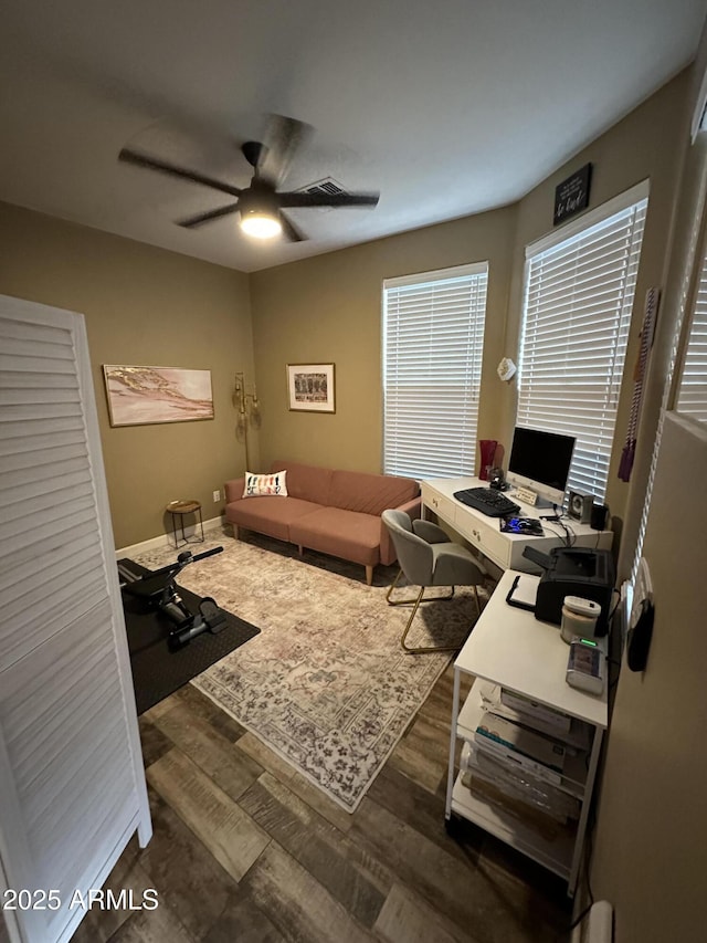 office area with wood finished floors and ceiling fan