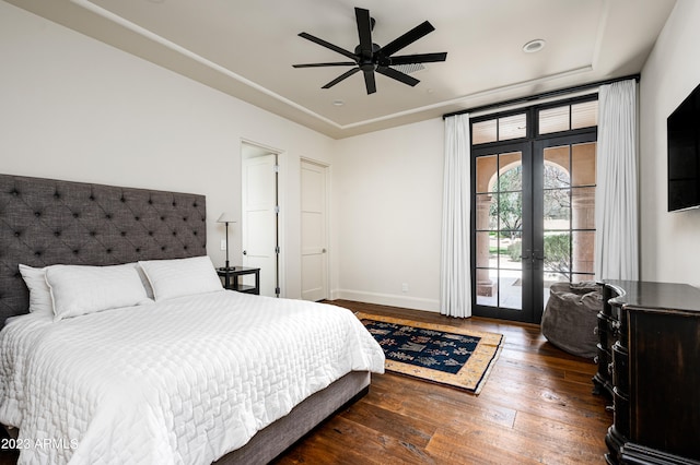 bedroom with ceiling fan, access to exterior, french doors, and dark hardwood / wood-style flooring