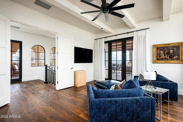 living room with beam ceiling, ceiling fan, french doors, and dark hardwood / wood-style flooring