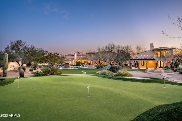 view of property's community with a patio