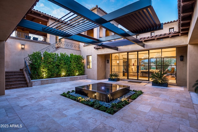 view of patio featuring a pergola