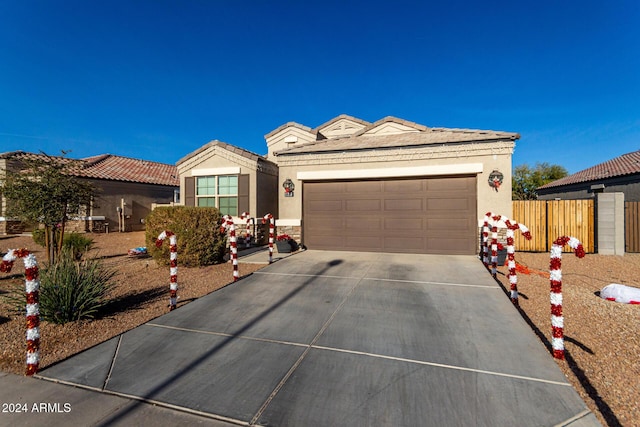 ranch-style home with a garage