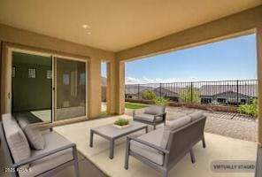 view of patio featuring outdoor lounge area and fence