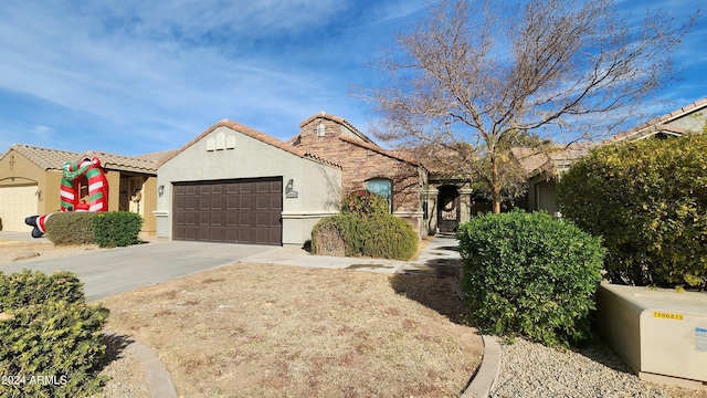 view of front of property featuring a garage