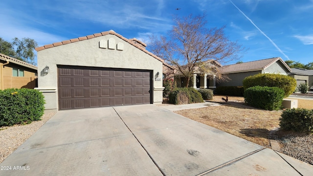 ranch-style home with a garage