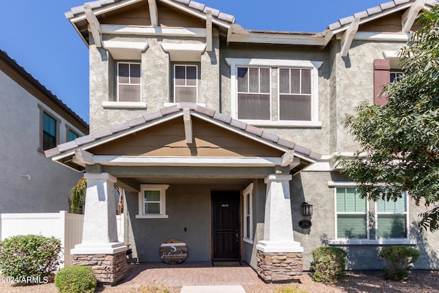 craftsman-style house with covered porch