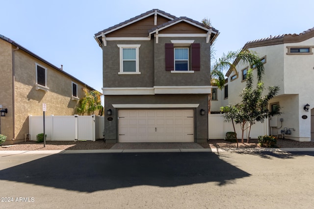 view of front of property with a garage