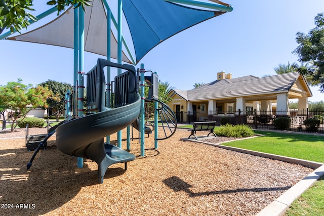 view of playground with a yard