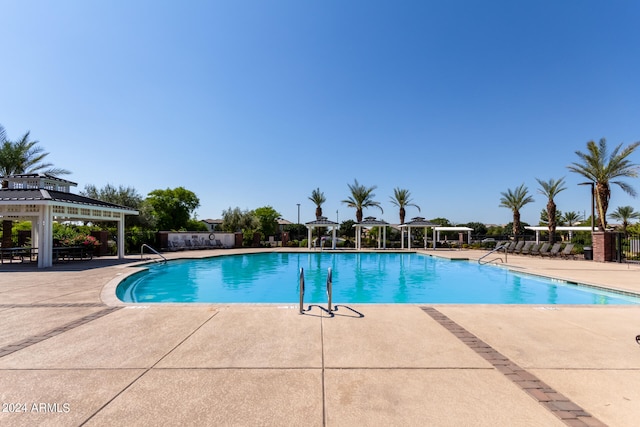 view of pool featuring a gazebo and a patio area