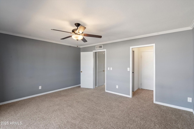 unfurnished bedroom featuring ceiling fan, ornamental molding, and light carpet