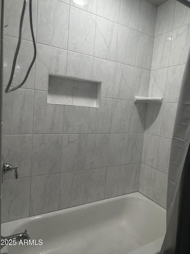 full bath featuring shower / bath combination