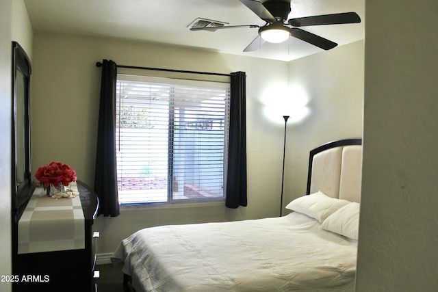 bedroom featuring ceiling fan