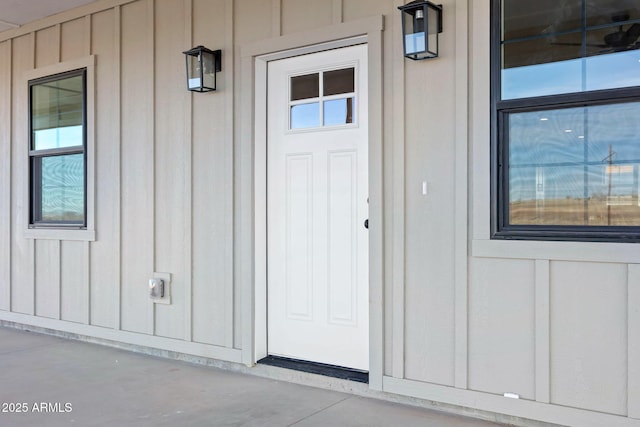 doorway to property with board and batten siding