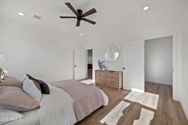 bedroom featuring recessed lighting, visible vents, and light wood-style floors