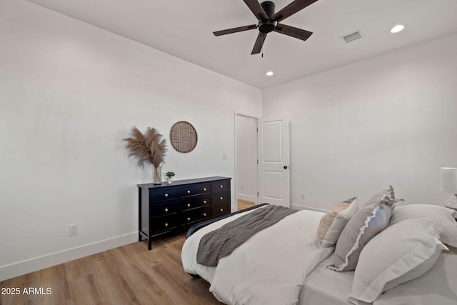 bedroom featuring recessed lighting, baseboards, visible vents, and light wood finished floors