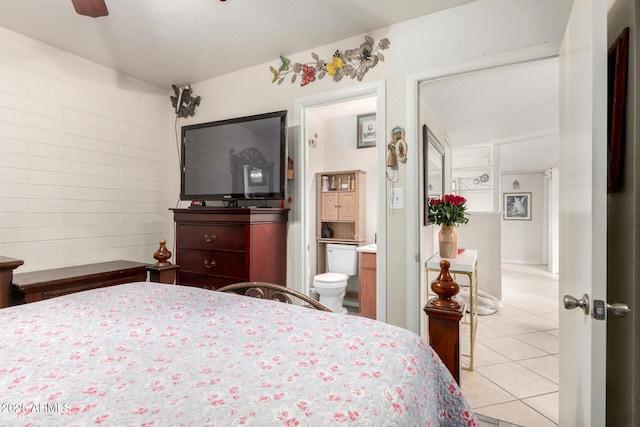 4403 N 56th Dr, Phoenix, AZ 85031 - bedroom featuring light tile patterned floors, ensuite bath, and ceiling fan