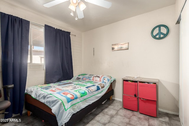 4403 N 56th Dr, Phoenix, AZ 85031 - bedroom with baseboards and ceiling fan