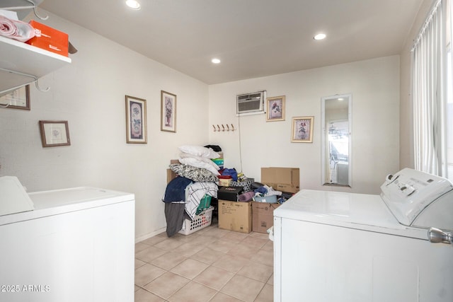 4403 N 56th Dr, Phoenix, AZ 85031 - laundry room with washing machine and dryer, a wall mounted air conditioner, light tile patterned floors, and recessed lighting