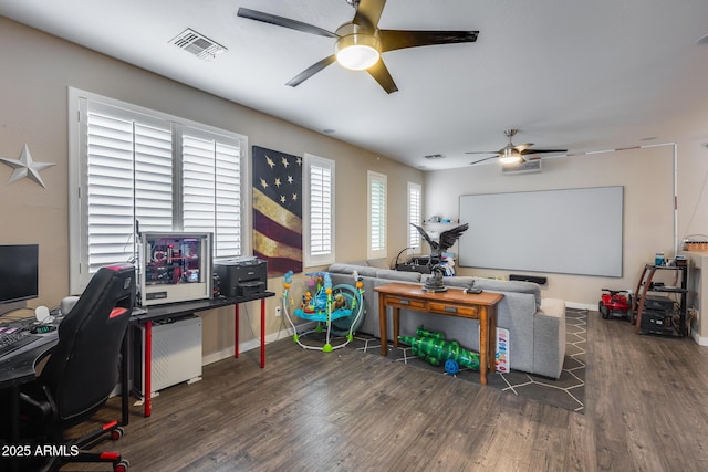 office space with ceiling fan and dark hardwood / wood-style flooring