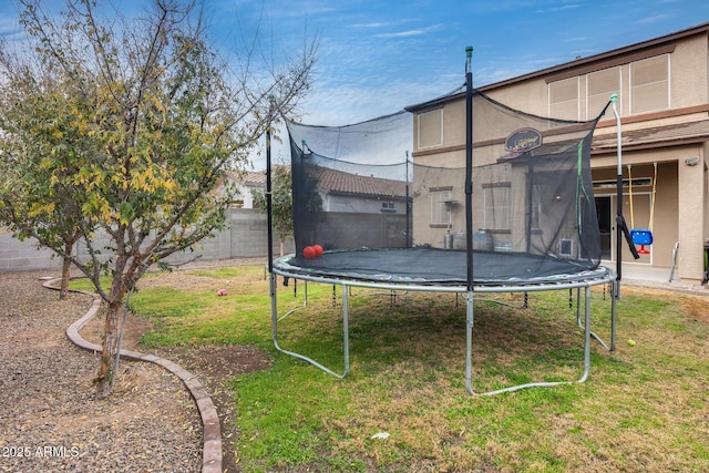 view of yard with a trampoline