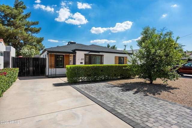69 W Virginia Ave, Phoenix, AZ 85003 - view of front of property with driveway and a gate