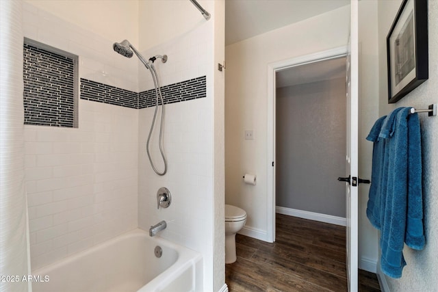 69 W Virginia Ave, Phoenix, AZ 85003 - full bath with toilet,  shower combination, wood finished floors, and baseboards