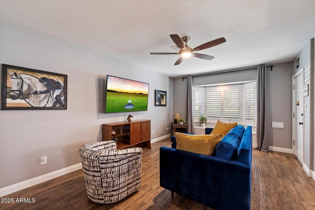 69 W Virginia Ave, Phoenix, AZ 85003 - living area featuring ceiling fan, wood finished floors, baseboards, and a textured ceiling