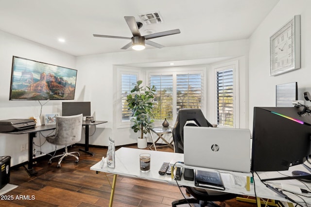 office area featuring dark wood-type flooring and ceiling fan